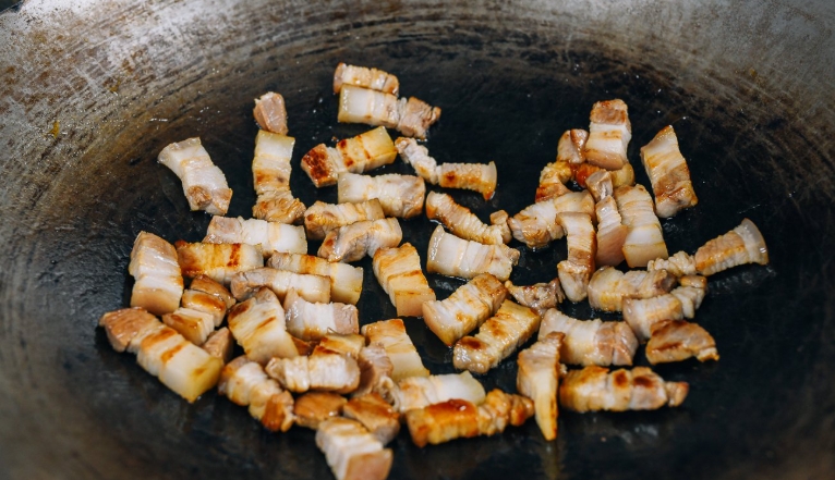 braised pork belly with mustard greens