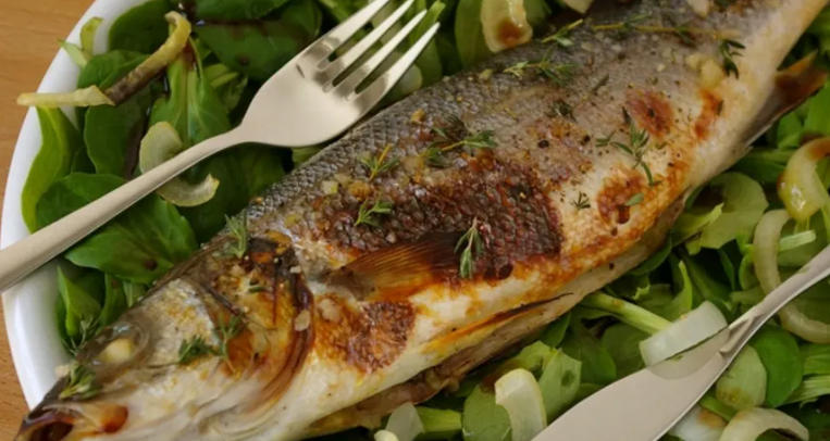 baked whole sea bass with ginger and spring onion