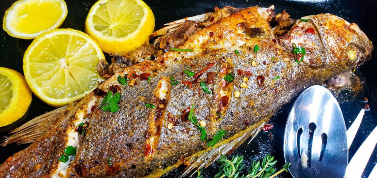 baked black bass with fresh herbs